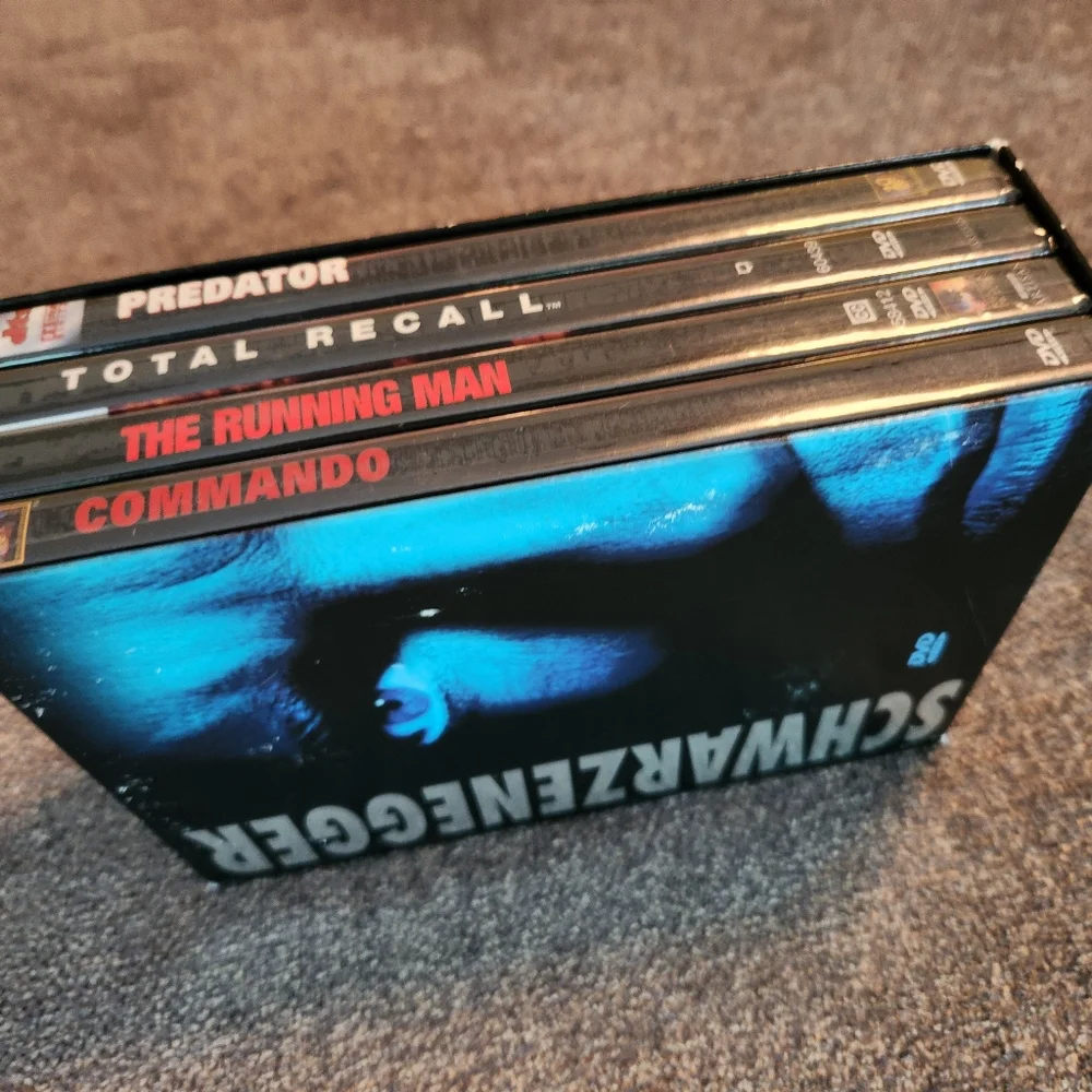 NWOT Arnokd Schwarzenegger Action Movie DVD Collection, 4 DVDs